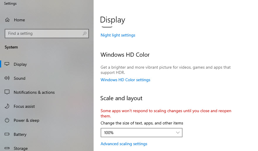 Figure 8. Shows Windows display settings screen options with Change the size of text, apps, and other items set to 100% under Scale layout